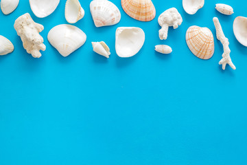 shells and seaside background for blog or desktop on blue table top view mockup