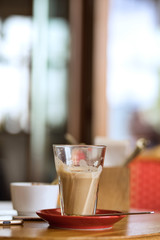 Big cup of coffee latte on a table