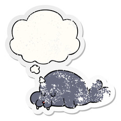 cartoon walrus and thought bubble as a distressed worn sticker