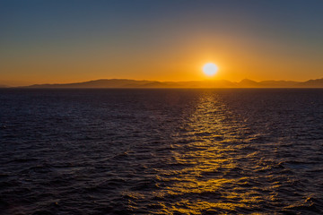 Spectacular sunset over the Saronic Gulf islands