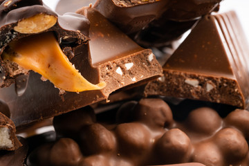 assorted chocolates on white background