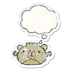 funny cartoon bear and thought bubble as a distressed worn sticker