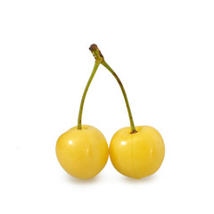 Yellow cherries isolated on white background