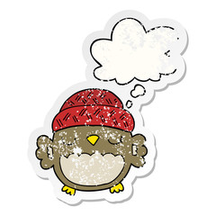 cute cartoon owl in hat and thought bubble as a distressed worn sticker