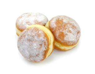 German doughnut berliner with icing sugar isolated on white. Donuts(Sufganiyah) isolated on white background one fresh baked with powered sugar. fresh dough-nut with jam. Serbian krofna