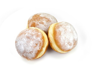 German doughnut berliner with icing sugar isolated on white. Donuts(Sufganiyah) isolated on white background one fresh baked with powered sugar. fresh dough-nut with jam. Serbian krofna