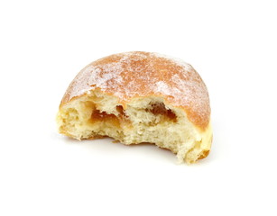 German doughnut berliner with icing sugar isolated on white. Donuts(Sufganiyah) isolated on white background one fresh baked with powered sugar. fresh dough-nut with jam. Serbian krofna