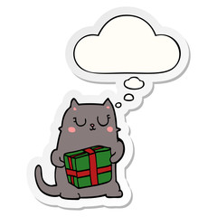 cartoon christmas cat and thought bubble as a printed sticker