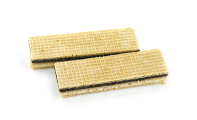 A stack of wafers filled with chocolate isolated on white background.