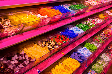  Candies shop with Variety of mixed colorful jelly candies in counter boxes