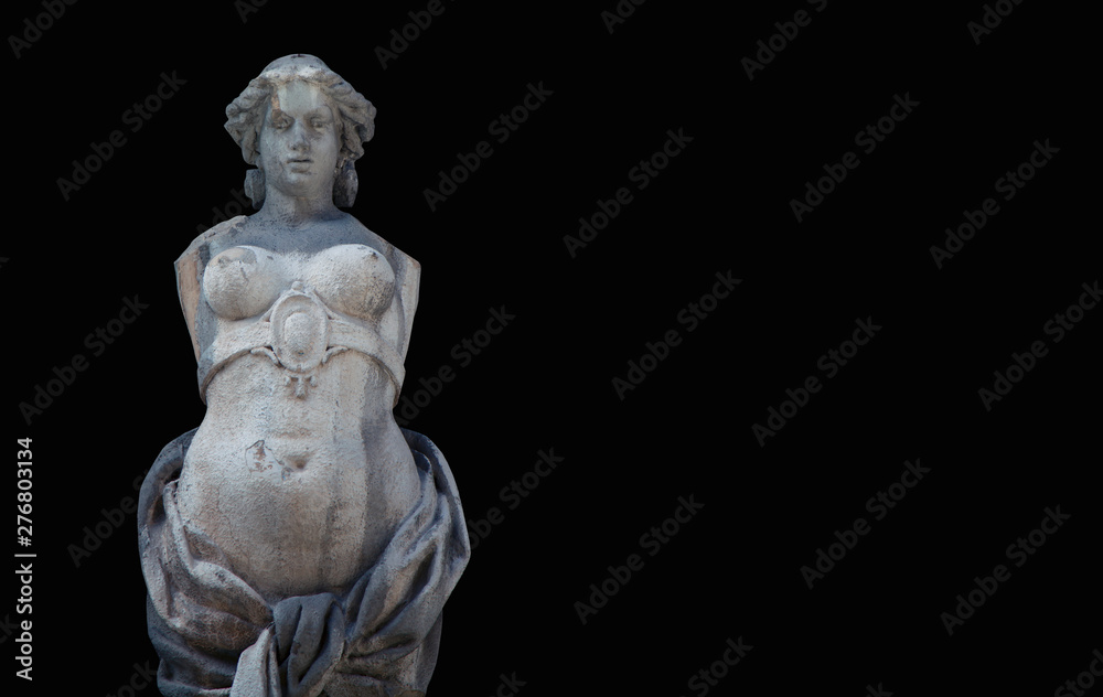 Wall mural The goddess of love in Greek mythology, Aphrodite (Venus in Roman mythology) Fragment of ancient statue against black background.