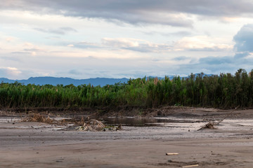 Sunset at Beni river cliffs, adventure in jungles of Madidi national park, Amazon river basin in Bolivia, South America