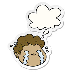 cartoon crying boy and thought bubble as a printed sticker