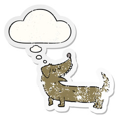 cartoon dog and thought bubble as a distressed worn sticker