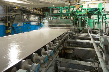 Paper production machine. Processing of secondary resources.  recycling. Large enterprise © goldenporshe