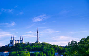 Obraz premium Lyon, France and the Basilica of Notre-Dame de Fourviere from Jardin des plantes.