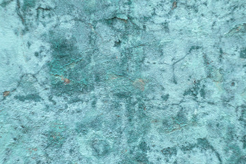bright textured concrete wall turquoise