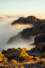 Nature and landscape of the Gran Canaria. Rocky mountains range, valleys, ocean.