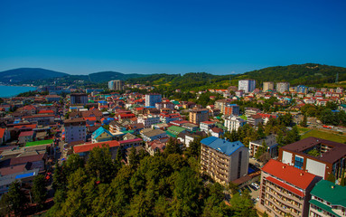 Beautiful panoramic autumn landscape at the resort city of Sochi on the Black sea coast. The view from the top.