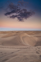 Dunes of Maspalomas at sunset, holiday destination, Gran Canaria Spain. 