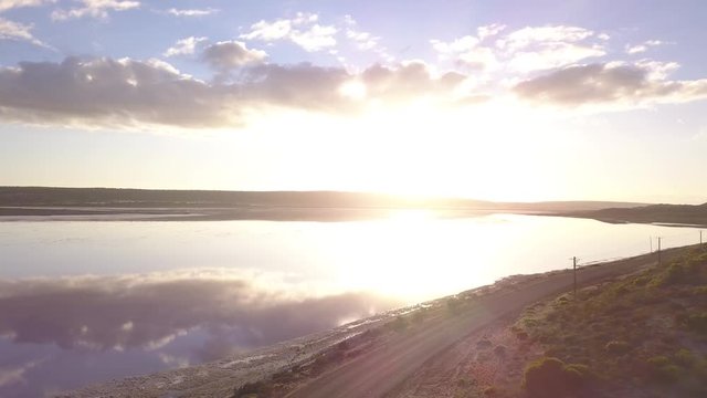 Aerial view of the Pink Lake in south west Australia. The pink lake reflects the red Australian desert sun in its clear water