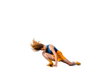 Young girl dancing hip-hop at studio isolated on white