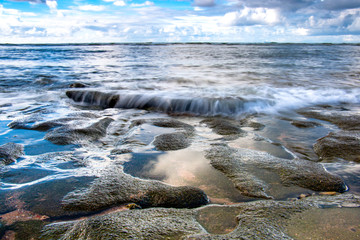 sea dripping from the rock