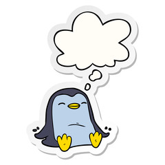 cartoon penguin and thought bubble as a printed sticker