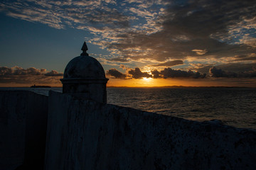 Sunset on the beach, with silhouettes 