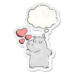 cartoon hippo in love and thought bubble as a distressed worn sticker