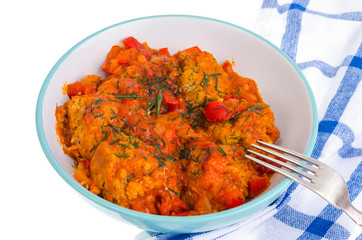 Meatballs meat, fish in tomato sauce with vegetables.