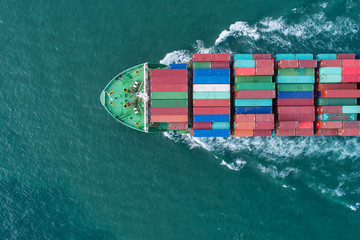 Aerial view container ship to sea port loading container for import export or transportation....