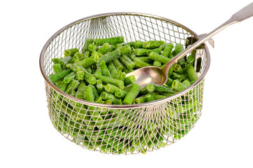 Deep-frozen green pods isolated on white