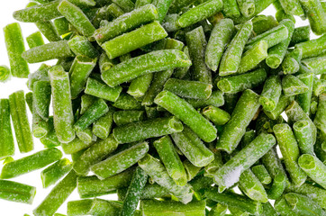 Deep-frozen green pods isolated on white