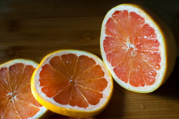 Fresh Grapefruit on a wooden cutting board