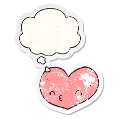 cartoon heart with face and thought bubble as a distressed worn sticker