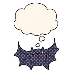 cartoon happy vampire bat and thought bubble in comic book style