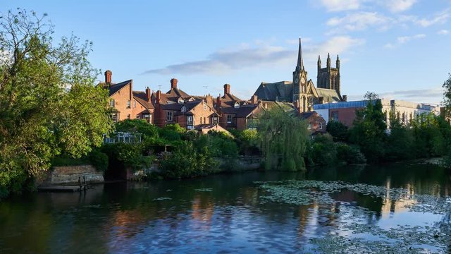 Timelapse of Royal Leamington Spa with the Parish church on a summer evening. Warwickshire, England, UK