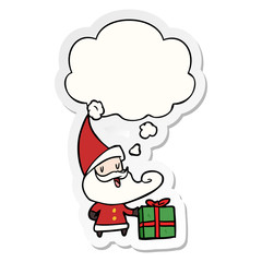 cartoon santa claus and thought bubble as a printed sticker