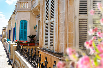 close up retro style old house window of Mediterranean architectural culture in Mediterranean island Malta