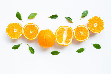 High vitamin C. Fresh orange citrus fruit with leaves isolated on white background.