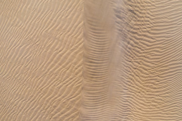 Fototapeta na wymiar dawn light, sand dune patterns