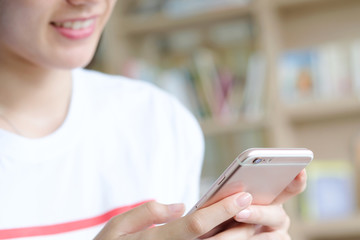 A pretty face girl, she is using smartphone and an internet network buy shopping online .Technology and Business concept