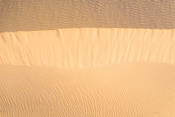 dawn light, sand dune patterns