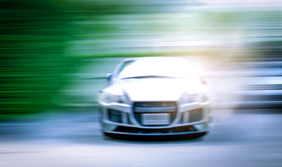 Blurred images of race cars in the Drift race. Colorful backgrounds and fast movements.