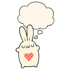 cute cartoon rabbit with love heart and thought bubble in comic book style