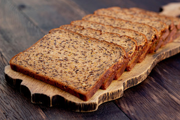 Bread slices on wooden oak table