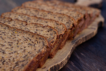 Bread slices on wooden oak table