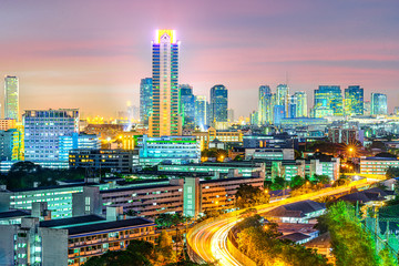 Fototapeta na wymiar Bangkok capital city of Thailand in mid town of Building condominium and apartment resident in night ligh, office tower modern building in downtown