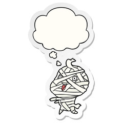 cartoon halloween mummy and thought bubble as a printed sticker